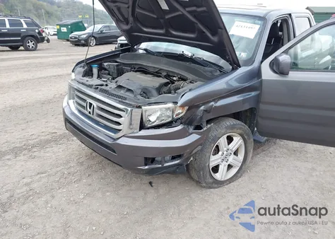 2014 Honda Ridgeline Rtl z USA, uszkodzony, nr VIN 5FPYK1F50EB003633